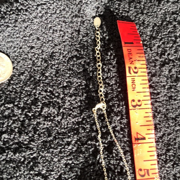 Heart bling dime size w/solid back with slight rub marks on back. Silver color. - Picture 11 of 15